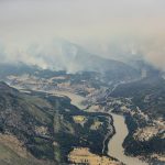 
              In this aerial photo taken from a helicopter, a wildfire burns in the mountains north of Lytton, British Columbia, on Thursday, July 1, 2021. A wildfire that forced people to flee a small town in British Columbia that had set record high temperatures for Canada on three consecutive days burned out of control Thursday as relatives desperately sought information on evacuees. (Darryl Dyck/The Canadian Press via AP)
            