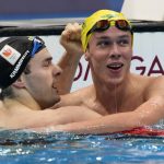 
              Izaac Stubbblety-Cook, right, of Australia, celebrates after winning the men's 200-meter breaststroke final with Arno Kamminga, of the Netherlandsat the 2020 Summer Olympics, Thursday, July 29, 2021, in Tokyo, Japan. (AP Photo/Martin Meissner)
            
