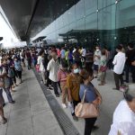 
              Residents wait on line to receive shots of the AstraZeneca COVID-19 vaccine at the Central Vaccination Center in Bangkok, Thailand, Thursday, July 22, 2021. (AP Photo/Sakchai Lalit) wait on line
            