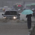 
              Heavy downpour in Zhengzhou city, central China's Henan province on Tuesday, July 20, 2021. Heavy flooding has hit central China following unusually heavy rains, with the subway system in the city of Zhengzhou inundated with rushing water. (Chinatopix Via AP)
            