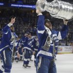 
              Tampa Bay Lightning center Brayden Point hoists the Stanley Cup after the team defeated the Montreal Canadiens in Game 5 of the NHL hockey Stanley Cup finals, Wednesday, July 7, 2021, in Tampa, Fla. (AP Photo/Phelan Ebenhack)
            