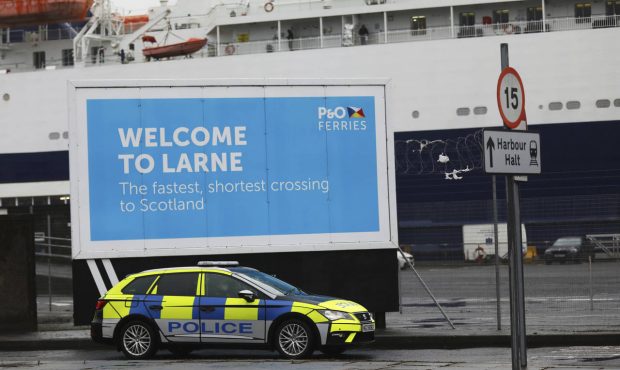 FILE - In this Feb. 2, 2021 file photo, police patrol the port of Larne, Northern Ireland. Tense po...