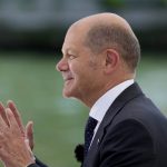 
              German Finance Minister Olaf Scholz gestures during an interview with a TV broadcaster, during a G20 Economy and Finance ministers and Central bank governors meeting in Venice, Italy, Friday, July 9, 2021. (AP Photo/Luca Bruno)
            