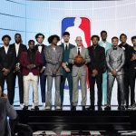 
              NBA Commissioner Adam Silver, center, poses for a photo with players projected to be first-round draft picks before the NBA basketball draft, Thursday, July 29, 2021, in New York. (AP Photo/Corey Sipkin)
            