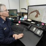 
              CORRECTS SPELLING OF FIRST NAME TO DANELL, NOT DANELLE - Cal Fire Capt. Danell Eshnaur uses the Fire Response Tactical Analyst program to use computer modeling to help pre-position fire fighting resources on the Dixie Fire at the California Department of Forestry and Fire Protection's Sacramento Command Center in Rancho Cordova, Calif., Friday, July 23, 2021. Firefighters are trying to become smarter in how they prepare for the drought- and wind-driven wildfires that have become more dangerous across the American West in recent years, including by using new technology like fire behavior computer modeling that can help assess risks before fires start, then project their path and growth. (AP Photo/Rich Pedroncelli)
            