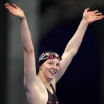 
              Lydia Jacoby of the United States waves after winning the final of the women's 100-meter breaststroke at the 2020 Summer Olympics, Tuesday, July 27, 2021, in Tokyo, Japan. (AP Photo/Matthias Schrader)
            