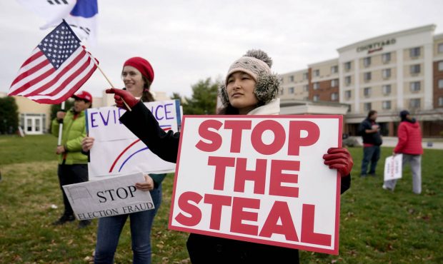 FILE - In this Wednesday, Nov. 25, 2020 file photo, Supporters of President Donald Trump gather out...