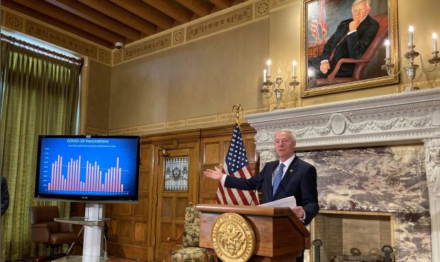 Arkansas Gov. Asa Hutchinson talks about COVID-19 vaccinations at the state Capitol in Little Rock,...