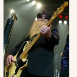 
              FILE - Dusty Hill of U.S. rock band ZZ Top performs on stage during their first concert in Germany in Hamburg, northern Germany, on Oct. 8, 2002. ZZ Top has announced that Hill, one of the Texas blues trio's bearded figures and bassist, has died at his Houston home. He was 72. In a Facebook post, bandmates Billy Gibbons and Frank Beard revealed Wednesday, July 28, 2021, that Hill had died in his sleep. (AP Photo/Christof Stache, File)
            