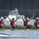 
              Chen Yunxia, Zhang Ling, Lyu Yang and Cui Xiaotong of China celebrate after winning gold in the women's rowing quadruple sculls final at the 2020 Summer Olympics, Wednesday, July 28, 2021, in Tokyo, Japan. (AP Photo/Darron Cummings)
            