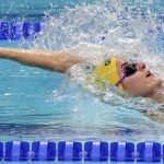
              FILE - Australia's Kaylee McKeown competes in a women's 200-meter backstroke heat during the swimming competitions of the World Aquatics Championships in Budapest, Hungary, in this Friday, July 28, 2017, file photo. Lilly King stirred up the already heated rivalry with the Australians by making a bold prediction for the U.S. women at the Tokyo Aquatics Center. (AP Photo/Michael Sohn)
            