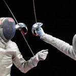 
              Luigi Samele of Italy, left, loses his saber as he competes against Kim Junhgwhan of South Korea in a men's individual semifinal Sabre competition at the 2020 Summer Olympics, Saturday, July 24, 2021, in Chiba, Japan. (AP Photo/Andrew Medichini)
            