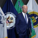President Joe Biden listens as he is introduced to speak during a visit to the Office of the Director of National Intelligence in McLean, Va., Tuesday, July 27, 2021. This is Biden's first visit to an agency of the U.S. intelligence community. (AP Photo/Susan Walsh)