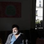 
              Photographer Joao Luiz Bulcao, of Brazil, rests in his apartment in the Montmatre district of Paris on May 23, 2021. After more than a year with no work, he is starting to get commissions again from tourists and romantics who hire him for artful souvenir photos in Paris, to immortalize their memories made in the City of Light. (AP Photo/Joao Luiz Bulcao)
            