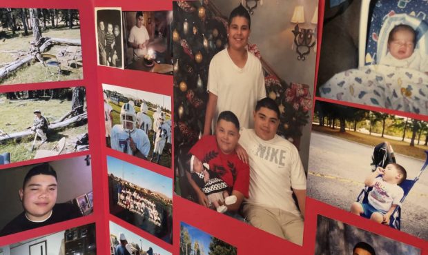 This July 15, 2021 image shows one of the memorial photo boards dedicated to Elias Otero in his fam...