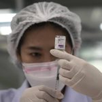 
              A health worker prepares a shot of the AstraZeneca COVID-19 vaccine for people at the Central Vaccination Center in Bangkok, Thailand, Thursday, July 22, 2021. (AP Photo/Sakchai Lalit)
            