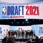 
              NBA Commissioner Adam Silver, center, poses for a photo with players projected to be first-round draft picks before the NBA basketball draft, Thursday, July 29, 2021, in New York. (AP Photo/Corey Sipkin)
            