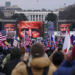 
              FILE - In this Jan. 6, 2021 file photo, Trump supporters participate in a rally in Washington. Months after Donald Trump’s supporters besieged the Capitol, the ex-president and his supporters are revising their account of that day. (AP Photo/John Minchillo, File)
            