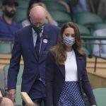 
              Britain's Kate, Duchess of Cambridge arrives in the Royal Box on Centre Court on day five of the Wimbledon Tennis Championships in London, Friday July 2, 2021. (AP Photo/Kirsty Wigglesworth)
            