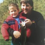 
              In this photo provided by Brett Eagleson, Sept. 11 victim Bruce Eagleson holds his son Brett and a fish they caught together at a fishing derby in New Hampshire in 1993. Eagleson and others who have lost family on Sept 11 are seeking the release of FBI documents that allege Saudi Arabia's role in the terrorist attacks. A lawsuit that accuses Saudi Arabia of being complicit took a major step forward this year with the questioning under oath of former Saudi officials, but those depositions remain under seal and the U.S. has withheld a trove of other documents as too sensitive for disclosure. (Brett Eagleson via AP)
            