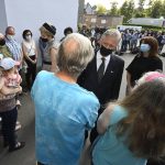 
              Belgium's King Philippe, center right, and Belgium's Queen Mathilde, center left, speaks with residents, prior to participating in a ceremony of one minute of silence to pay respect to victims of the recent floods in Belgium, in Verviers, Belgium, Tuesday, July 20, 2021. Belgium is holding a day of mourning on Tuesday to show respect to the victims of the devastating flooding last week, when massive rains turned streets in eastern Europe into deadly torrents of water, mud and flotsam. (Eric Lalmand, Pool Photo via AP)
            