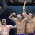 
              United States men's 4x100m freestyle relay team of Bowen Becker, Blake Pieroni and Caeleb Dressel react after winning the gold medal at the 2020 Summer Olympics, Monday, July 26, 2021, in Tokyo, Japan. (AP Photo/Matthias Schrader)
            