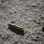 
              Ammunition casings lay on the ground near the entrance to the house of late Haitian President Jovenel Moise in Port-au-Prince, Haiti, Wednesday, July 7, 2021. Moïse was assassinated in an attack on his private residence early Wednesday, and first lady Martine Moïse was shot in the overnight attack and hospitalized, according to a statement from the country’s interim prime minister. (AP Photo/Joseph Odelyn)
            