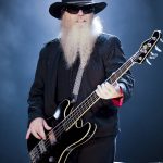 
              FILE - Bassist and vocalist Dusty Hill, from the US rock band, ZZ Top performs at the F1 Rocks concert on Sept. 25, 2009, in Singapore. ZZ Top has announced that Hill, one of the Texas blues trio's bearded figures and bassist, has died at his Houston home. He was 72. In a Facebook post, bandmates Billy Gibbons and Frank Beard revealed Wednesday, July 28, 2021, that Hill had died in his sleep. (AP Photo/Joan Leong, File)
            