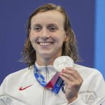 
              Katie Ledecky, of the United States poses with her silver medal in the women's 400-meters freestyle at the 2020 Summer Olympics, Monday, July 26, 2021, in Tokyo, Japan. (AP Photo/Matthias Schrader)
            