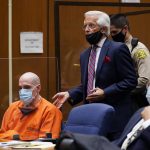 
              Michael Thomas Gargiulo, left, listens to his defense attorney Daniel Nardoni, as he pleads for his client during a sentencing hearing, along with attorney Dale Michael Rubin, right, at Los Angeles Superior Court, Friday, July 16, 2021. A judge denied a new trial for a man prosecutors called “The Boy Next Door Killer,” who could be sentenced to death later Friday for the home-invasion murders of two women and the attempted murder of a third.   (AP Photo/Damian Dovarganes)
            