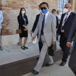 
              Japan's Finance Minister Taro Aso, center, arrives for a G20 meeting of Economy and Finance ministers and Central bank governors, in Venice, Italy, Friday, July 9, 2021.  (AP Photo/Luca Bruno)
            