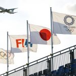 
              A commercial passenger jet approaches Haneda Airport above the field hockey complex at the 2020 Summer Olympics, Thursday, July 22, 2021, in Tokyo, Japan. (AP Photo/John Minchillo)
            