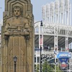 
              A guardian rests on the Hope Memorial Bridge within site of Progressive Field, Friday, July 23, 2021, in Cleveland. Cleveland's new name was inspired by two large landmark stone edifices near the downtown ballpark, referred to as traffic guardians, on the Hope Memorial Bridge over the Cuyahoga River. The team's colors will remain the same, and the new Guardians' new logos will incorporate some of the architectural features of the bridge. (AP Photo/Tony Dejak)
            