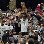 
              The Milwaukee Bucks celebrate with the championship trophy after defeating the Phoenix Suns in Game 6 of basketball's NBA Finals in Milwaukee, Tuesday, July 20, 2021. The Bucks won 105-98. (AP Photo/Paul Sancya)
            
