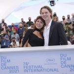 
              Mercedes Kilmer, left, and Jack Kilmer, children of actor Val Kilmer, pose for photographers at a photo call for the film 'Val' during the 74th international film festival, Cannes, southern France, Wednesday, July 7, 2021. (AP Photo/Vadim Ghirda)
            