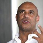 
              Laurent Lamothe, a former prime minister of Haiti, speaks during an interview in Miami Beach, Fla., following the news that Haitian President Jovenel Moïse was assassinated in an attack on his private residence, Wednesday, July 7, 2021. (AP Photo/Lynne Sladky)
            