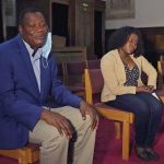 
              Advocates for the Haitian community, Rev. Dieufort Fleurissaint, left, and Barbara Antoine reflect on the news of the assassination of Haiti's President Jovenel Moïse, Wednesday, July 7, 2021, in Boston. The assassination of Moïse has drawn shock and condemnation from leaders around the world, along with calls for calm and unity in Haiti. (AP Photo/Elise Amendola)
            