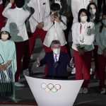 
              President of the International Olympic Committee Thomas Bach speaks during the opening ceremony at the Olympic Stadium at the 2020 Summer Olympics, Friday, July 23, 2021, in Tokyo. (AP Photo/Morry Gash)
            