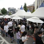 
              People queue in line to wait for the coronavirus testing at a Public Health Center in Seoul, South Korea, Friday, July 9, 2021. South Korea will enforce its strongest social distancing restrictions in the greater capital area starting next week as it wrestles with what appears to be the worst wave of the coronavirus since the start of the pandemic. (AP Photo/Ahn Young-joon)
            