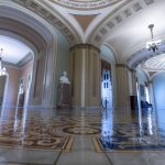 
              This June 30, 2021, photo shows the halls of the Capitol in Washington. The U.S. Capitol is still closed to most public visitors. It's the longest stretch ever that the building has been off-limits in its 200-plus year history. (AP Photo/Alex Brandon)
            