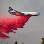 
              In this photo provided by the Bootleg Fire Incident Command, a DC-10 tanker drops retardant over the Bootleg Fire in southern Oregon, Thursday, July 15, 2021. Meteorologists predicted critically dangerous fire weather through at least Monday with lightning possible in both California and southern Oregon. (Bootleg Fire Incident Command via AP)
            