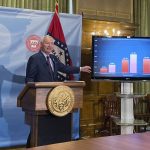 
              FILE - In this July 29, 2021 file photo, Arkansas Gov. Asa Hutchinson stands next to a chart displaying COVID-19 hospitalization data as he speaks at a news conference at the state Capitol in Little Rock, Ark. An Arkansas judge has temporarily blocked the state from enforcing a law that prevents schools and other governmental agencies from requiring masks. Pulaski County Circuit Judge Tim Fox on Friday, Aug. 6, 2021, issued a preliminary injunction against the law Gov. Asa Hutchinson signed in April.(AP Photo/Andrew DeMillo)
            