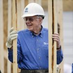 
              FILE - In this Nov. 2, 2015, file photo, former President Jimmy Carter works at a Habitat for Humanity building site in Memphis, Tenn. Carter is sometimes called a better former president than he was president. The backhanded compliment has always rankled Carter allies and, they say, the former president himself. Yet now, 40 years removed from the White House, the most famous resident of Plains, Georgia, is riding a new wave of attention as biographers, filmmakers, climate activists and Carter’s fellow Democrats push for a recasting of his presidential legacy. (AP Photo/Mark Humphrey, File)
            