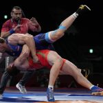 
              Russian Olympic Committee's Evloev Musa, bottom, and Armenia's Artur Aleksanyan compete during the men's 97kg Greco-Roman wrestling final match at the 2020 Summer Olympics, Tuesday, Aug. 3, 2021, in Chiba, Japan. (AP Photo/Aaron Favila)
            