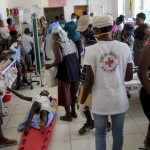 
              People injured in Saturday's 7.2-magnitude earthquake and their relatives, crowd in an emergency room at the Saint Antoine hospital in Jeremie, Haiti, Wednesday, Aug. 18, 2021. (AP Photo/Matias Delacroix)
            