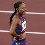 
              FILE - In this Aug. 6, 2021, file photo, Allyson Felix, of United States smiles after taking the bronze, in the final of women's 400-meters at the 2020 Summer Olympics, in Tokyo, Japan. (AP Photo/Francisco Seco, File)
            