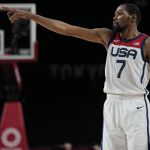 
              United States's Kevin Durant (7) gestures during men's basketball semifinal game against Australia at the 2020 Summer Olympics, Thursday, Aug. 5, 2021, in Saitama, Japan. (AP Photo/Eric Gay)
            
