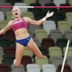 
              Katie Nageotte, of the United States, competes in the finals of the women's pole vault at the 2020 Summer Olympics, Thursday, Aug. 5, 2021, in Tokyo. (AP Photo/Martin Meissner)
            