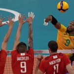 
              Brazil's Yoandy Leal Hidalgo, right, spikes the ball during the men's volleyball semifinal match between Brazil and Russian Olympic Committee at the 2020 Summer Olympics, Thursday, Aug. 5, 2021, in Tokyo, Japan. (AP Photo/Frank Augstein)
            