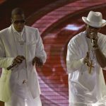 
              FILE - R. Kelly, right, and Jay-Z perform in Rosemont, Ill. at the first stop in their Best of Both Worlds Tour, on Sept. 30, 2004. Kelly filed a $90 million lawsuit against Jay-Z and a promoter, claiming breach of contract and sabotage. Jay-Z kicked Kelly off their 40 city tour, citing Kelly's "unpredictable behavior." Kelly will once again head to court this week. His federal trial in New York begins Wednesday, Aug. 18. 2021, and will explore years of sexual abuse allegations. He has vehemently denied the allegations against him. (AP Photo/Brian Kersey, File)
            
